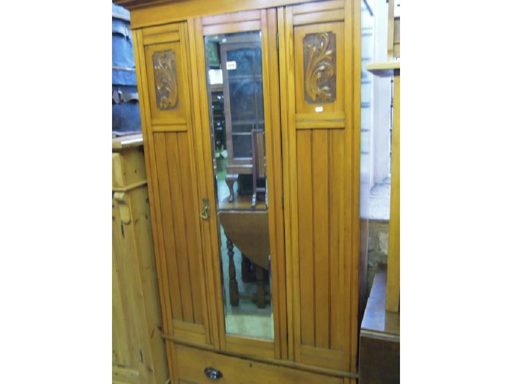 Appraisal: An Edwardian walnut single wardrobe with stepped and moulded cornice