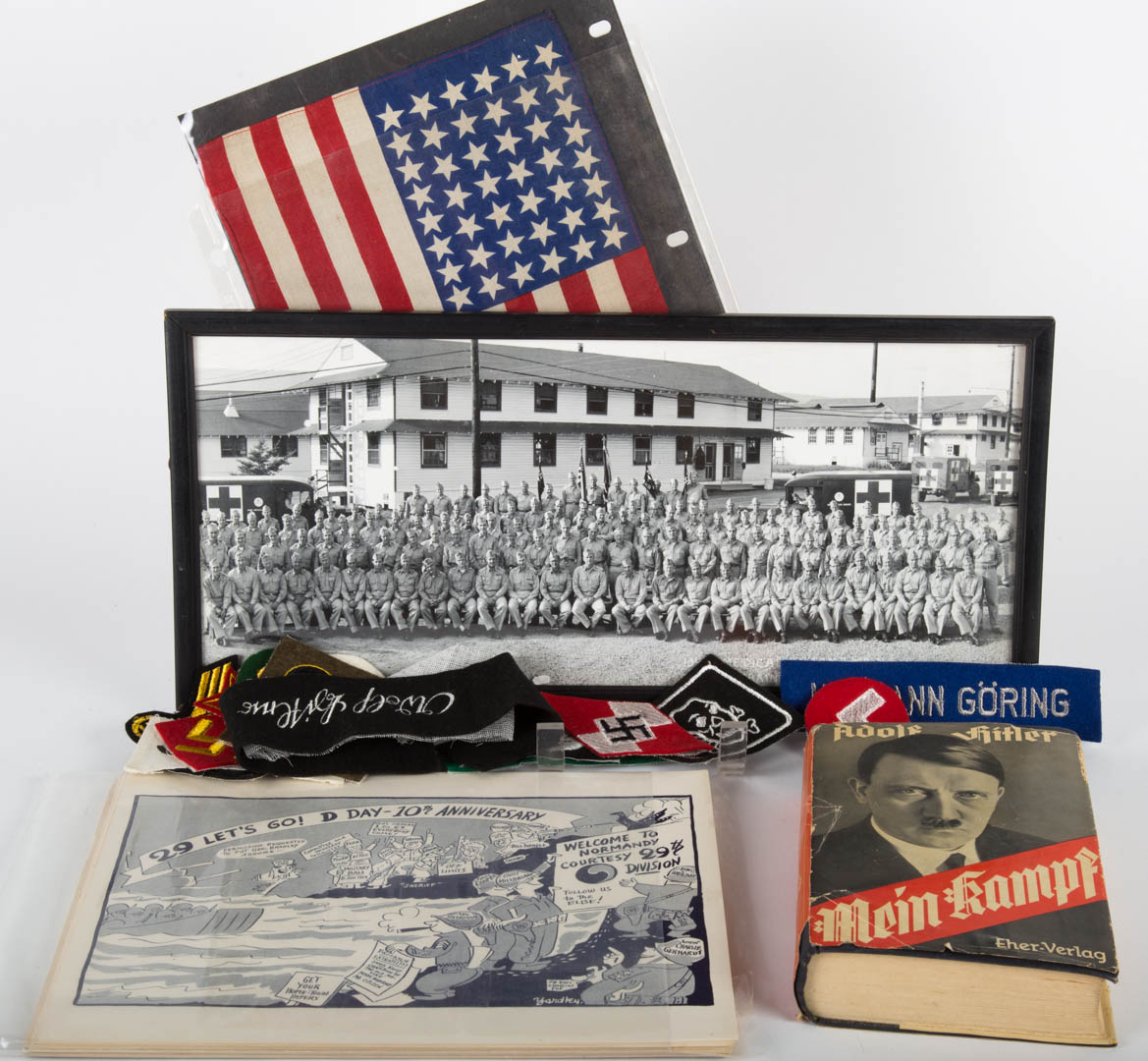 Appraisal: Assortment of military items including badges paper ephemera souvenir American