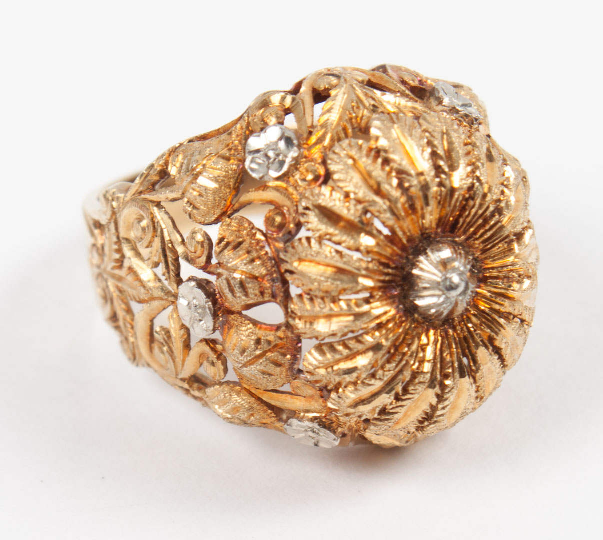 Appraisal: Lady's K Florentine gold flower-form dome ring chased openwork floral