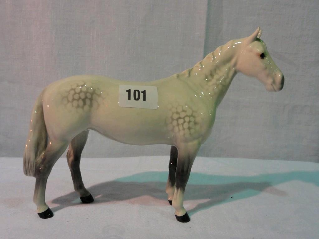 Appraisal: A Beswick model of a standing horse with pale dappled