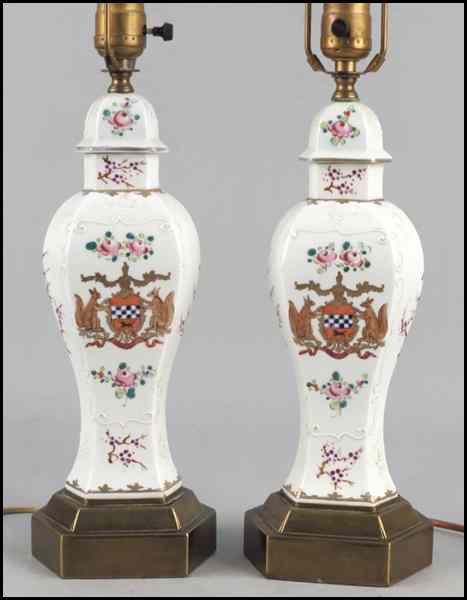 Appraisal: PAIR OF GILT AND PAINTED PORCELAIN TABLE LAMPS Porcelain height