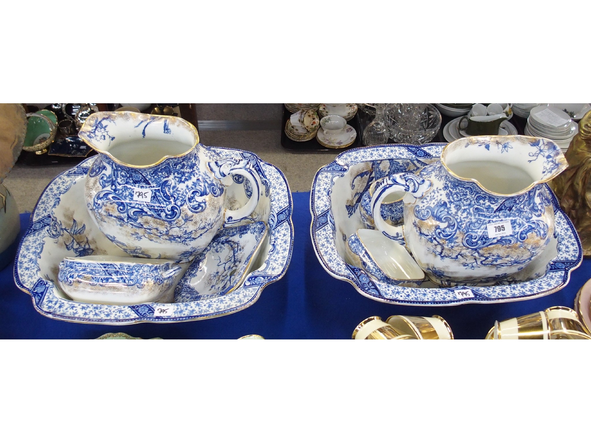 Appraisal: Pair of Doulton porcelain blue white and parcel gilt basin