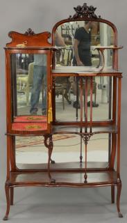 Appraisal: Mahogany Victorian etagere with bowed glass curio cabinet ht in