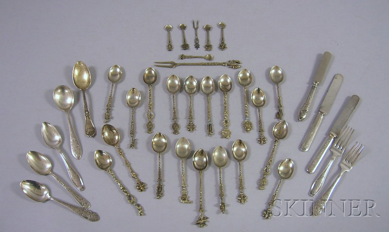 Appraisal: Group of Silver and Silver Plated Character Spoons and Knives