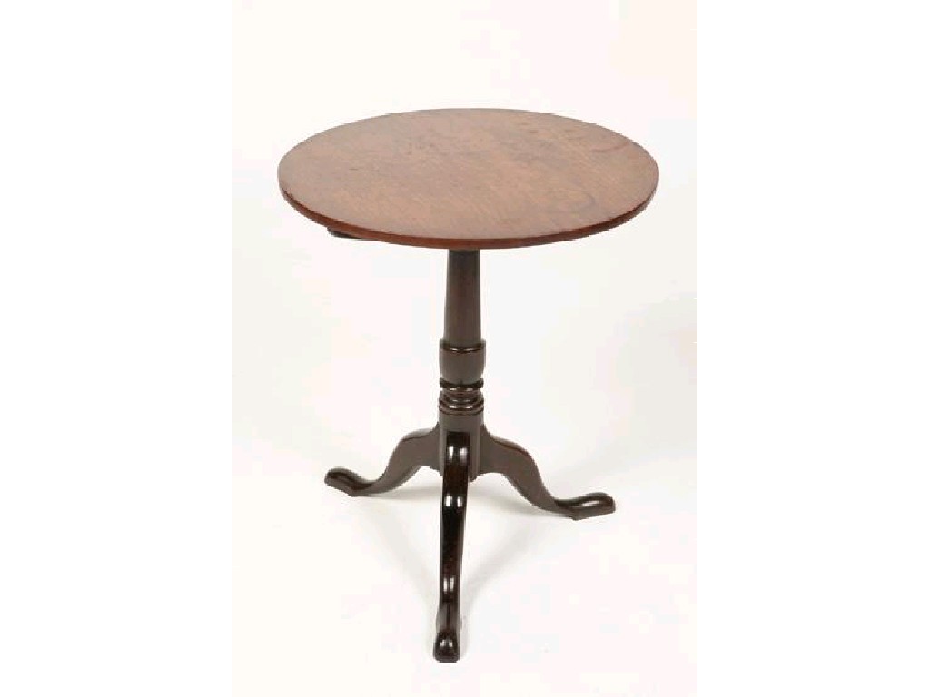 Appraisal: A GEORGE III MAHOGANY TIP-TOP OCCASIONAL TABLE the circular top