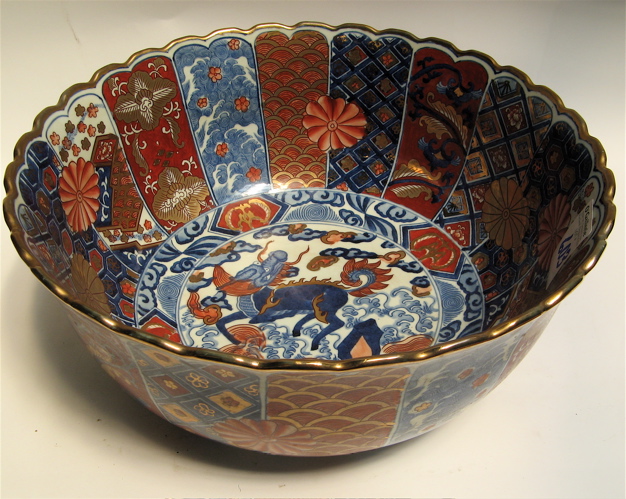 Appraisal: CHINESE IMARI PORCELAIN CENTER BOWL The multi-hued traditional vertical paneled