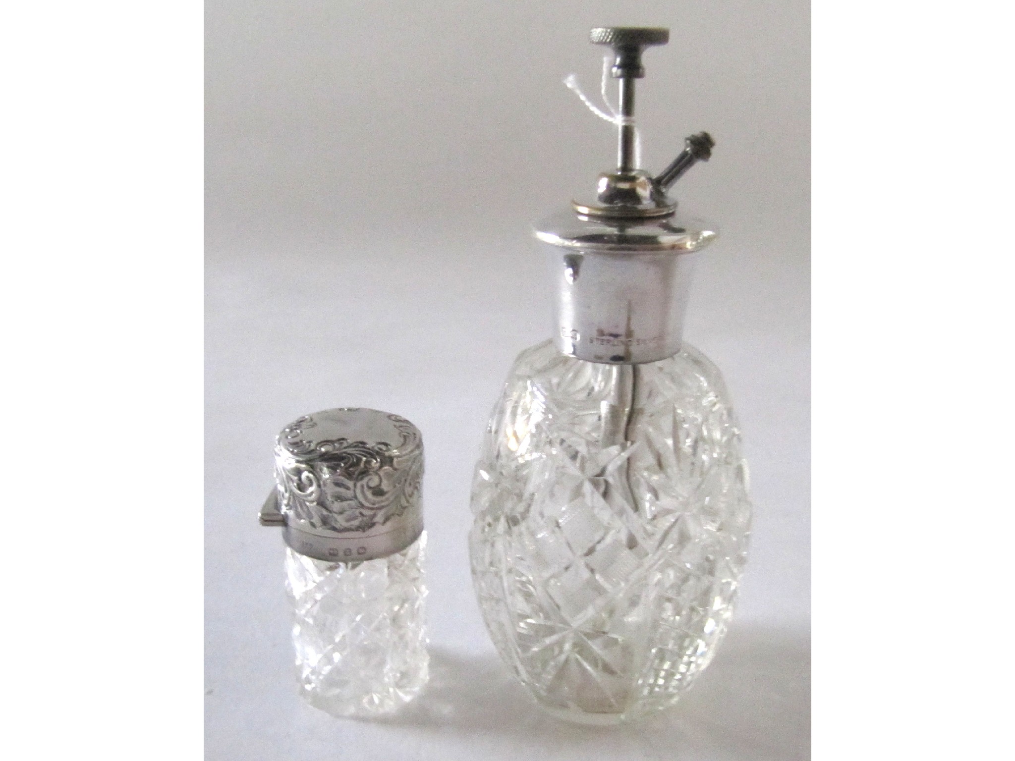 Appraisal: A lot comprising a sterling silver topped scent spray and