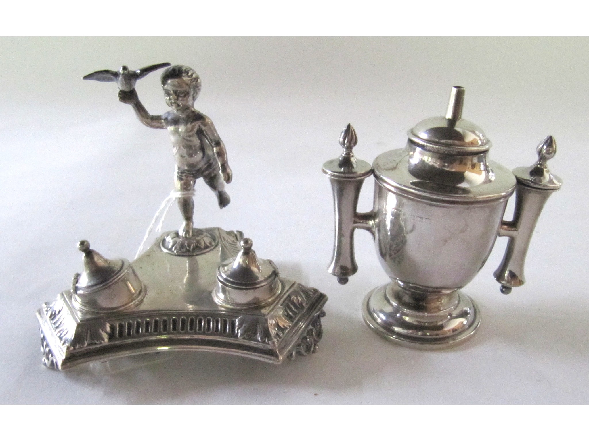 Appraisal: A lot comprising a silver condiment stand rubbed marks and