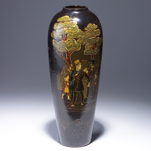 Appraisal: Tall WELLER Dickensware vase incised and painted with street scene