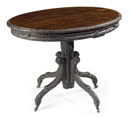 Appraisal: CONTINENTAL CARVED OAK CENTRE TABLE TH CENTURY the oval top