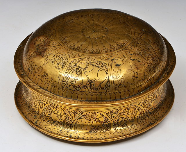 Appraisal: AN INDIAN ENGRAVED BRASS PANDAN HOLDER of circular form with