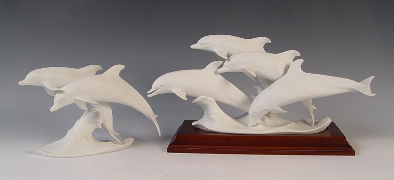 Appraisal: LARGE LEAPING DOLPHIN FIGURAL GROUPS Limited edition of the dolphin