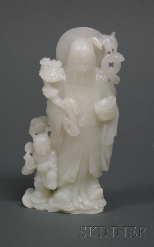 Appraisal: White Jade Carving China th century figure of the god