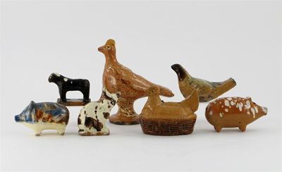 Appraisal: Seven pottery and slipware animals variously decorated with splashed and