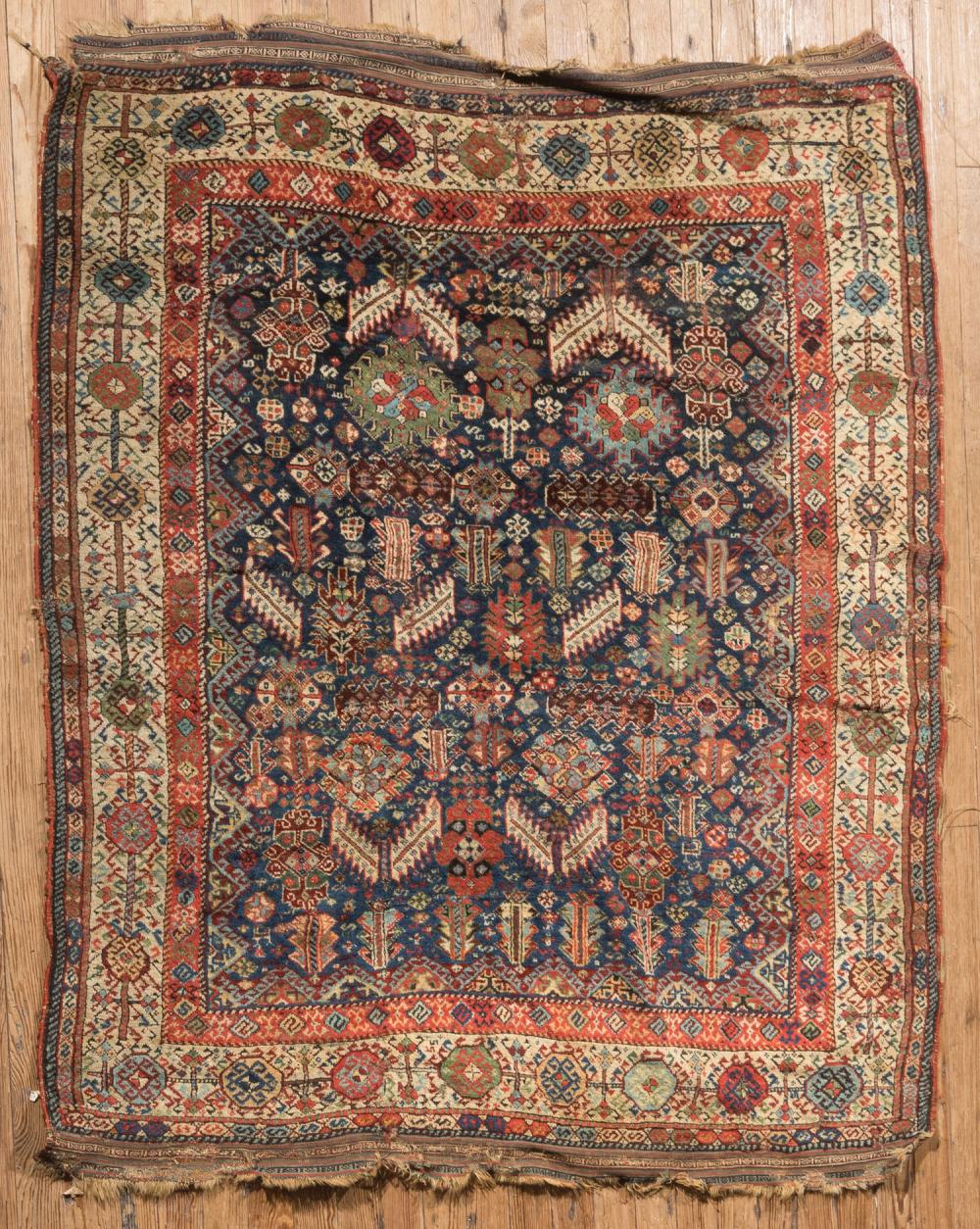 Appraisal: Antique Caucasian Carpet blue central ground repeating stylized designs ft