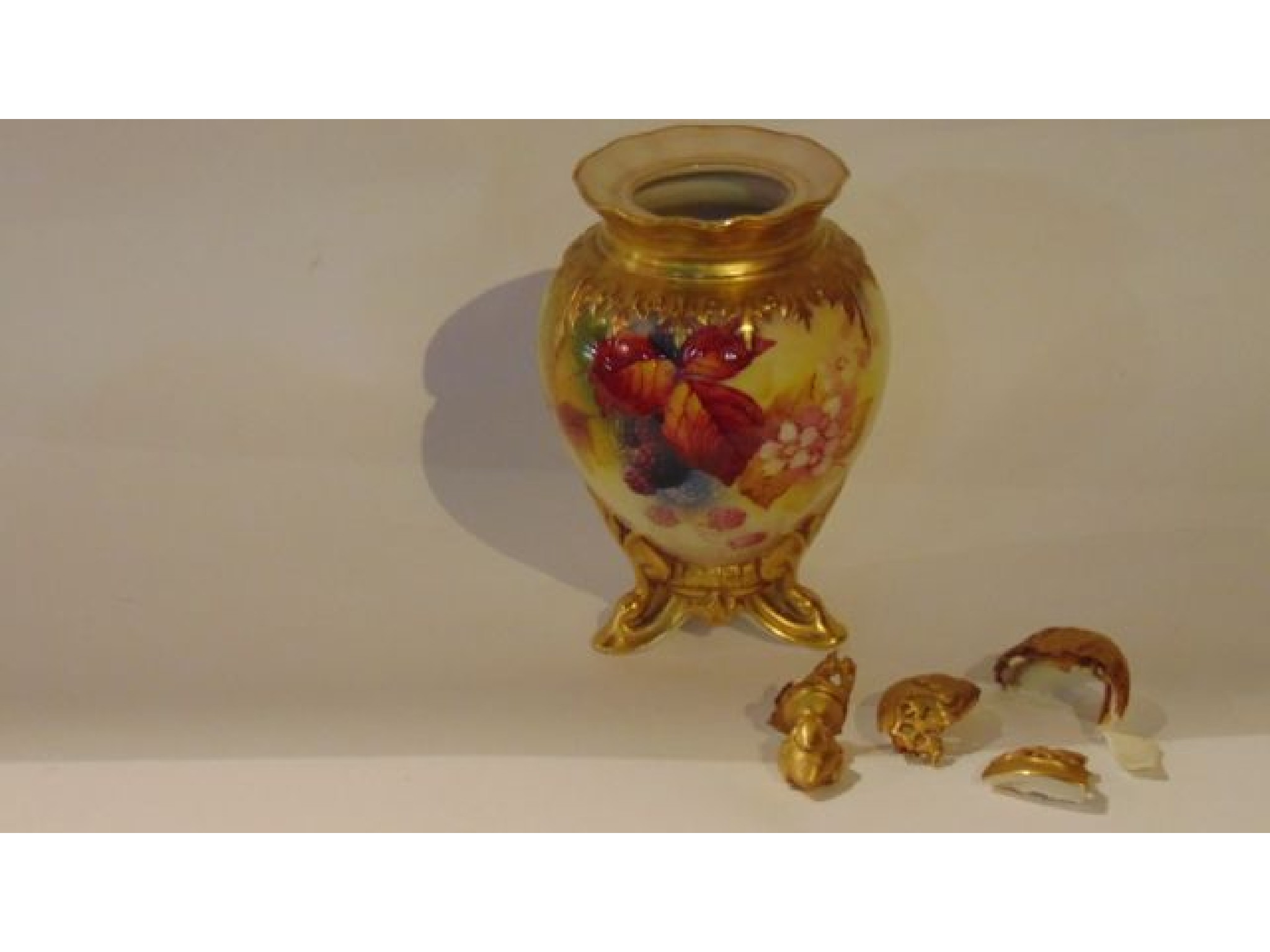 Appraisal: A Royal Worcester vase with finely painted blackberry and bramble