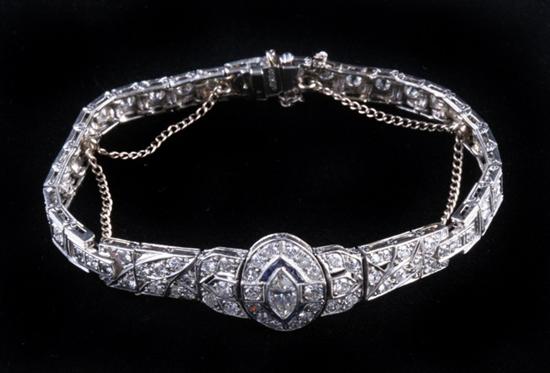 Appraisal: ART DECO PLATINUM DIAMOND AND SAPPHIRE FLEXIBLE-LINK BRACELET Marquise diamond