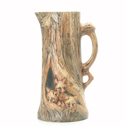 Appraisal: WELLER Woodcraft tall pitcher with foxes in their den restoration