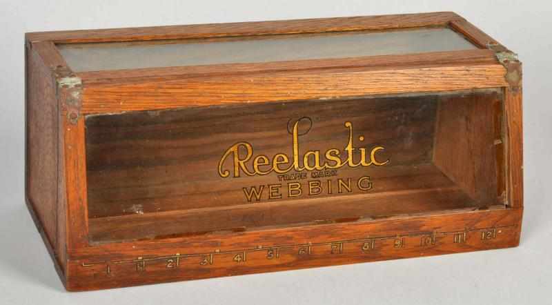 Appraisal: Glass Wood Reelastic Webbing Case Stencil accross front Condition Excellent