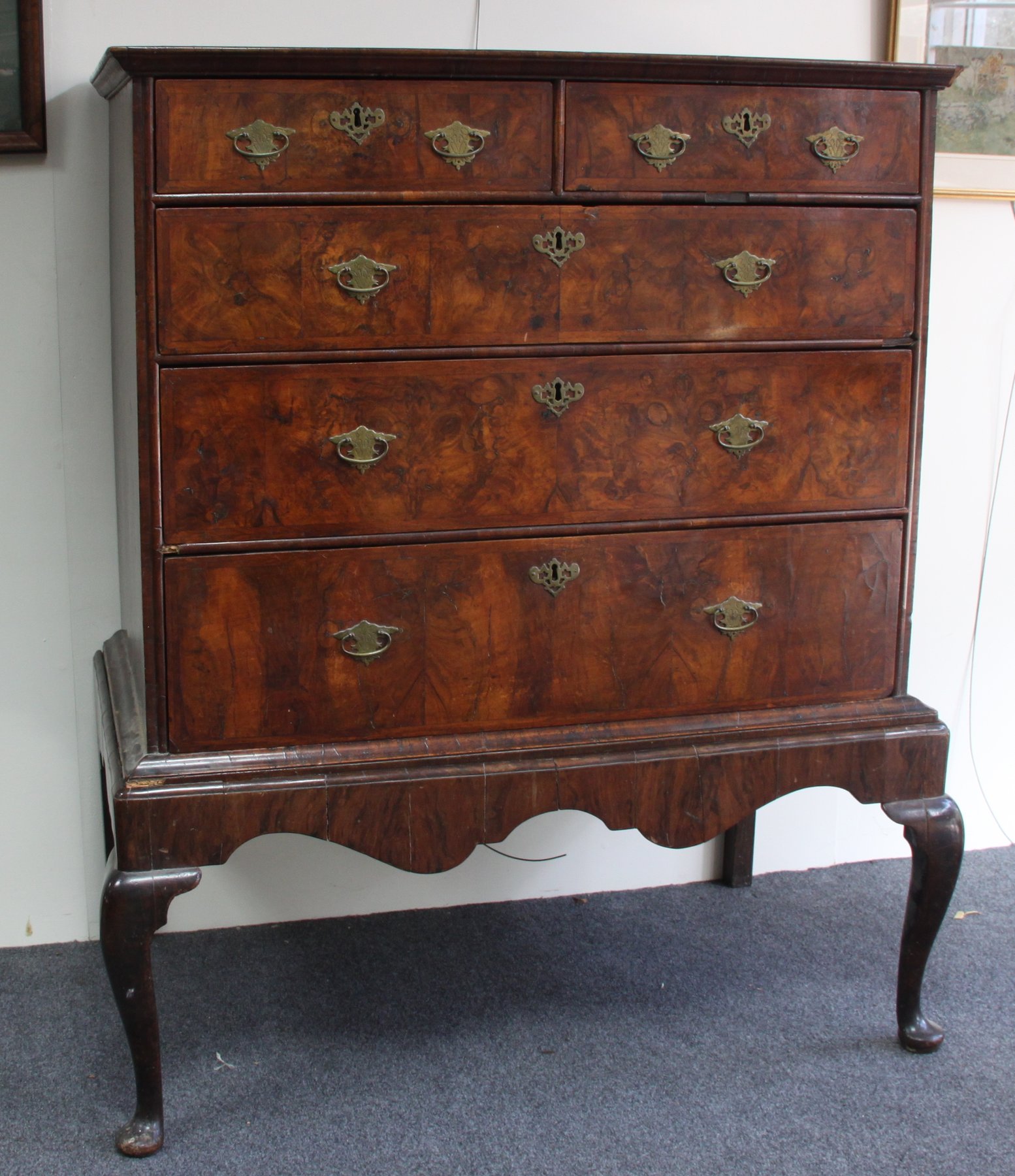 Appraisal: An th Century walnut chest on stand fitted two short