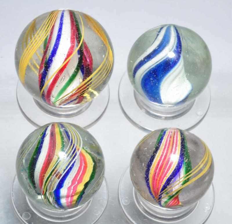 Appraisal: Lot of Handmade Swirl Marbles Description Includes one three-stage white