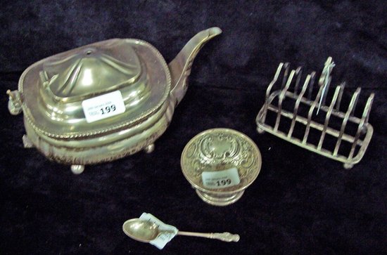 Appraisal: A teapot an embossed silver bowl a toast rack and