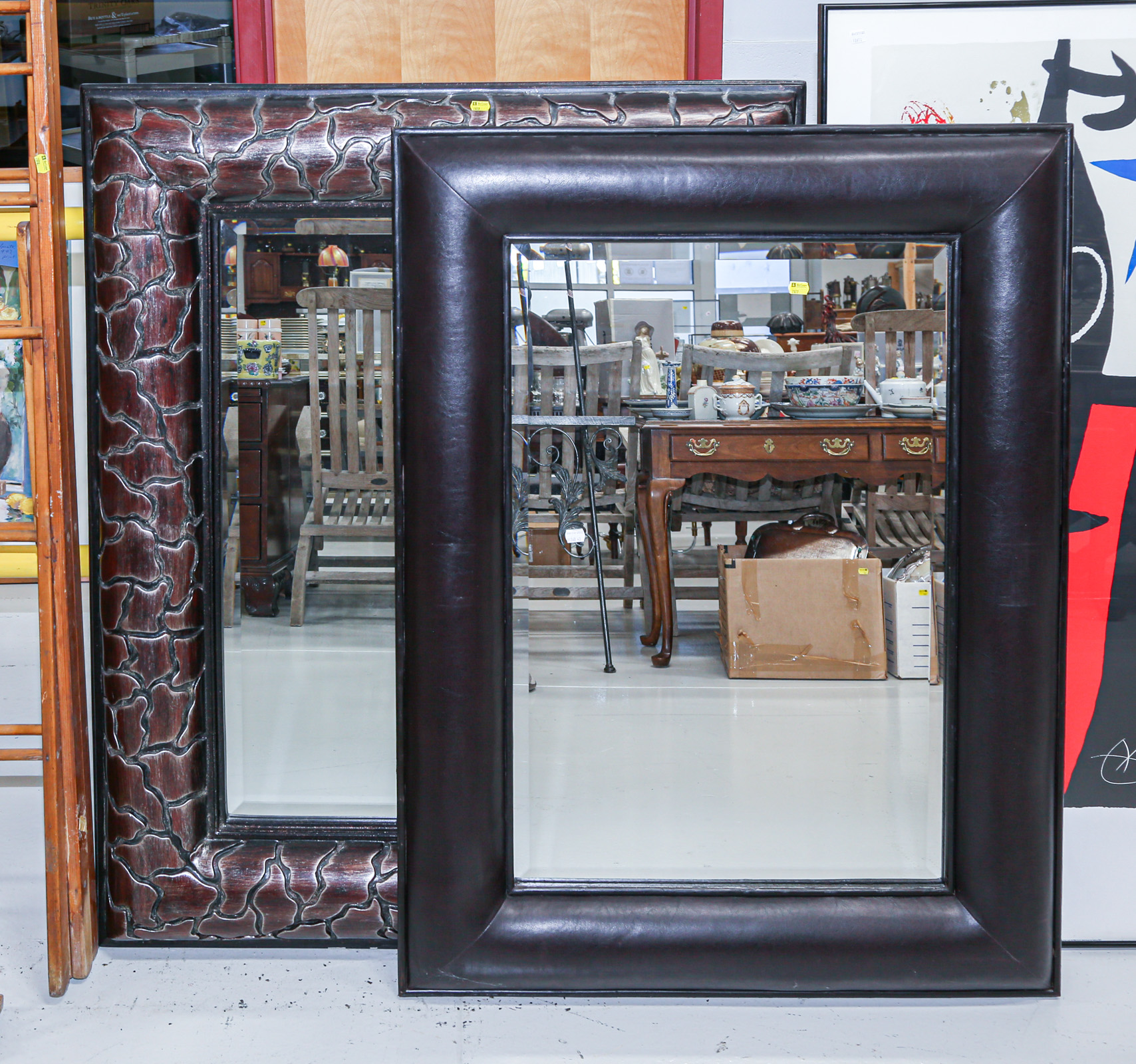 Appraisal: TWO LARGE FRAMED CONTEMPORARY MIRRORS Faux leather framed x in