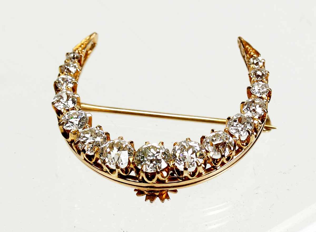 Appraisal: Crescent Brooch w Diamonds Diamonds Set in gold unmarked Dimensions