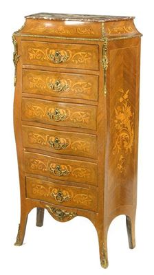 Appraisal: A French Kingwood and marquetry six drawer chest with a