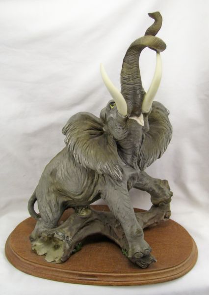 Appraisal: Resin Elephant by Auro Belcari Resin composition of a hand