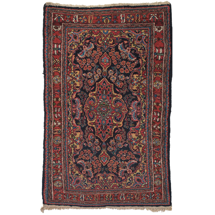 Appraisal: Persian Lilihan rug c floral design with a red border