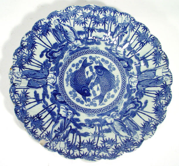 Appraisal: Chinese fluted porcelain charger transfer printed with blue fish and