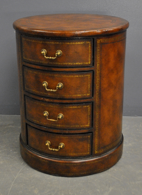 Appraisal: - Maitland Smith round leather to four-drawer stand h x