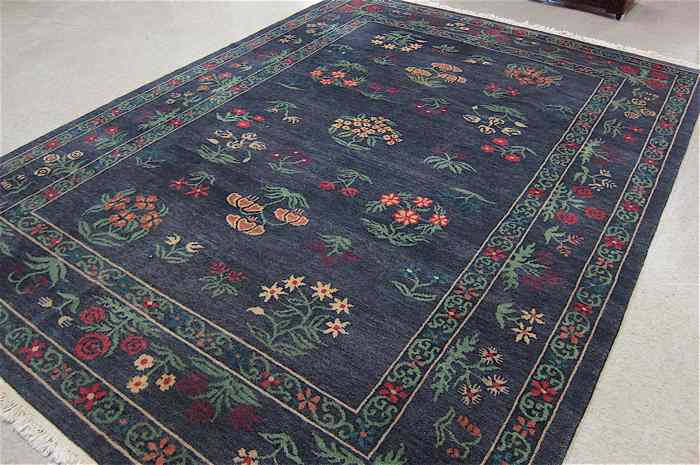 Appraisal: HAND KNOTTED ORIENTAL CARPET Indo-Persian scattered floral sprig motif on