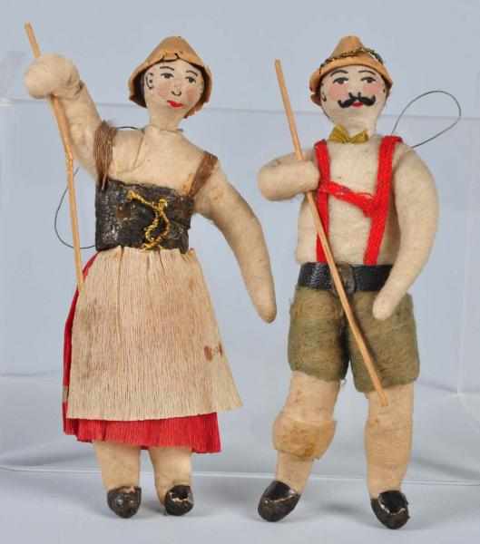 Appraisal: Lot of Cotton Bavarian Man Woman Ornaments Description Quite rare