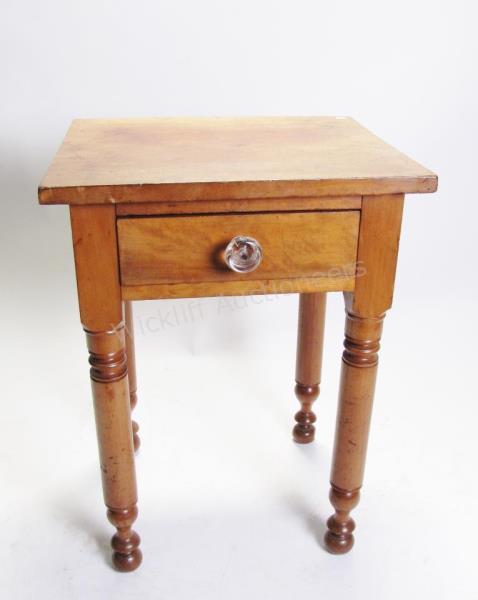 Appraisal: An antique cherry -drawer stand table with turned legs Sandwich-style