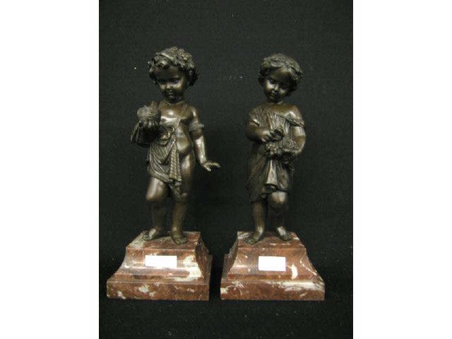 Appraisal: Pair of French Victorian Bronze Statues of Children boy with