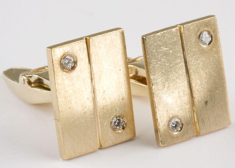 Appraisal: KT Gold and Diamond Cuff Links with four round diamonds