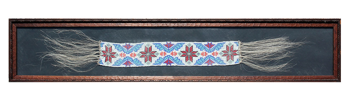 Appraisal: FRAMED SIOUX BEADED BELT Stylized floral and geometric patterns on