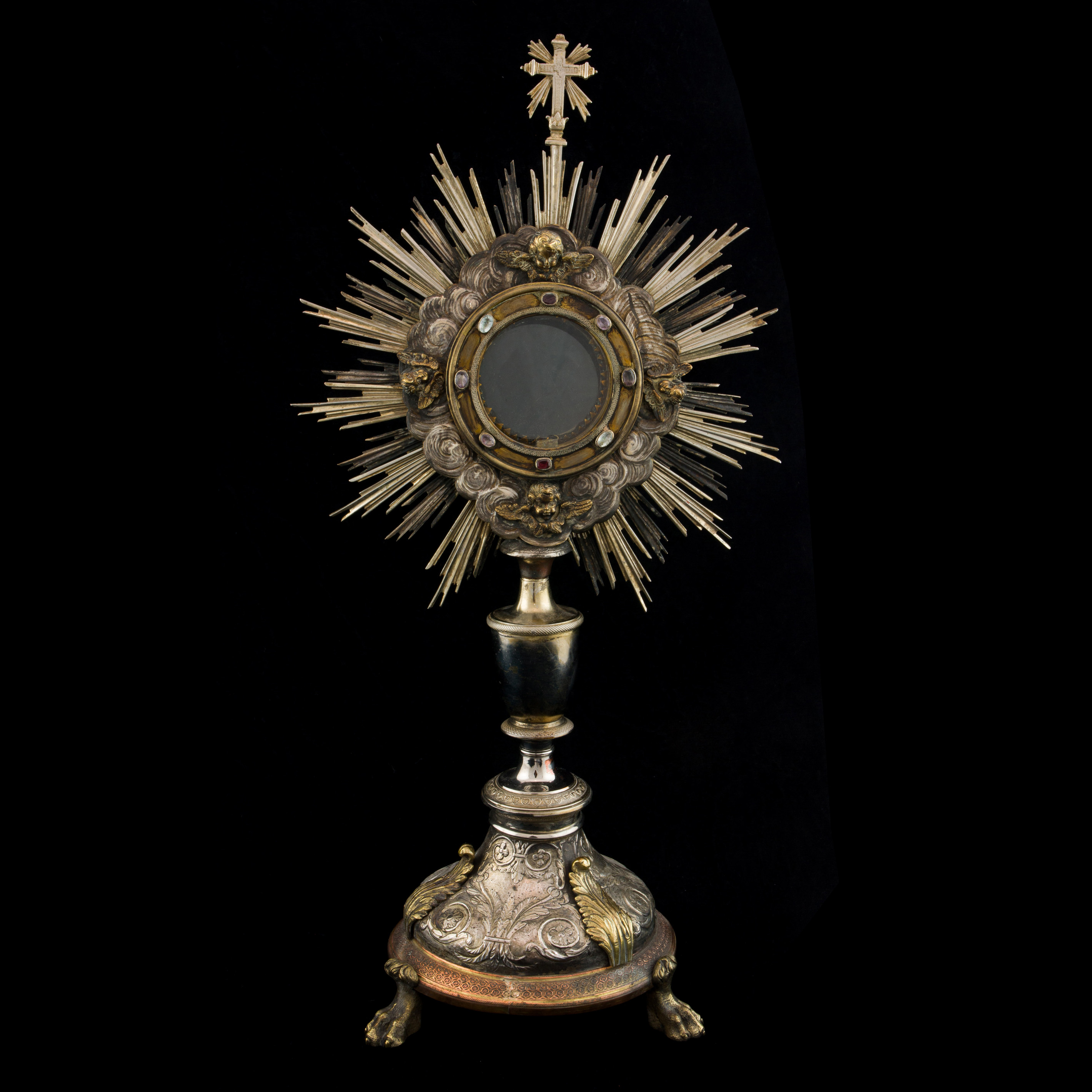 Appraisal: A CONTINENTAL SILVER AND MIXED METAL MONSTRANCE A Continental silver