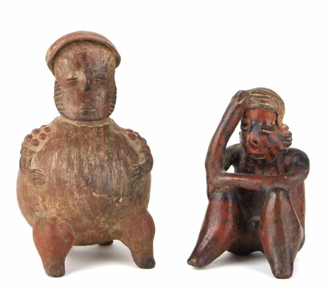 Appraisal: Two Pre-Columbian clay figures A Jalisco seated figure B C