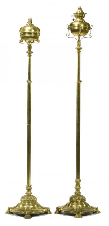 Appraisal: A PAIR OF VICTORIAN BRASS OIL LAMPS on telescopic stands