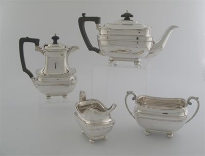 Appraisal: A modern four piece tea service with rounded oblong bodies