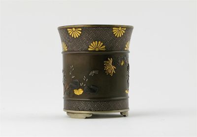 Appraisal: A small Japanese iron and bronze vase the body inlaid