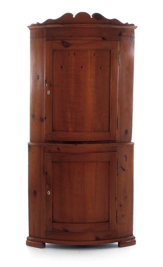 Appraisal: English pine bowfront corner cabinet first part th century molded