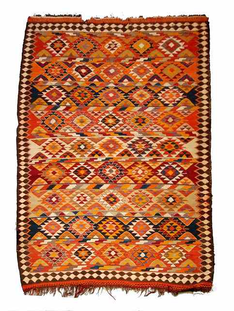 Appraisal: AN EASTERN PROBABLY TURKISH MULTI COLOURED KELIM decorated in geometric