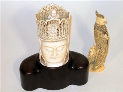 Appraisal: Chinese elephant ivory phoenix and head on stand models Comprised