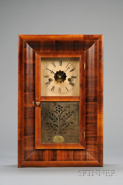 Appraisal: Miniature Mahogany Ogee Clock by Waterbury Clock Company Waterbury Connecticut