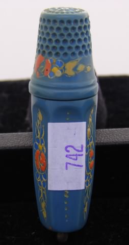 Appraisal: Plastic turquoise floral decorated mending tube