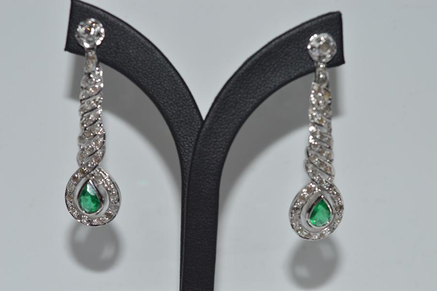 Appraisal: A PAIR OF ART DECO STYLE SYNTHETIC EMERALD AND ROSE